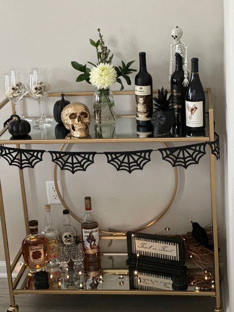 Add some spooky fun to your bar cart this Halloween season! 🖤 Gold Bar Cart Styling, Halloween Bar Cart, Halloween Bar, Gold Bar Cart, Bar Cart Styling, Gold Bar, Halloween Season, Bar Cart, Bar