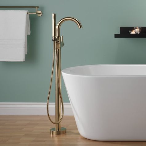 T4759-SSFL,FL,CZFL Delta Trinsic Single Handle Floor Mounted Freestanding Tub Filler & Reviews | Wayfair Delta Trinsic Champagne Bronze, Delta Champagne Bronze, Delta Trinsic, House Addition, Clawfoot Tub Faucet, Bathroom Master, Freestanding Tub Filler, House Bathrooms, Bronze Bathroom