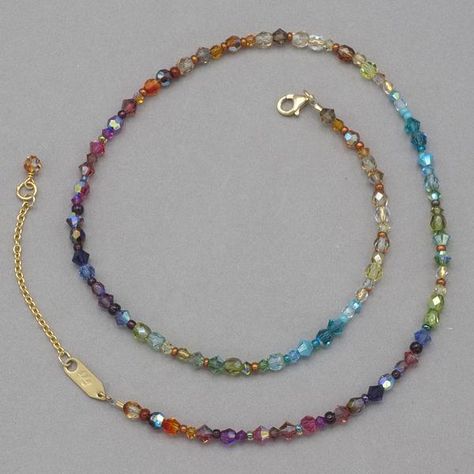 The full spectrum of polychromatic sparkle cascades in a glittering rainbow of European crystal and Bohemian glass in our Reverie Necklace. An elegant way to add vibrant color to your look. Swarovski crystal and bohemian glass with a gold overlay clasp. Measures 16-18" long. Holly Yashi, Pear Shaped Diamond Necklace, Diamond Initial Necklace, Dainty Diamond Necklace, Horseshoe Necklace, Diy Jewelry Necklace, Diy Jewlery, Necklace Craft, Emerald Necklace