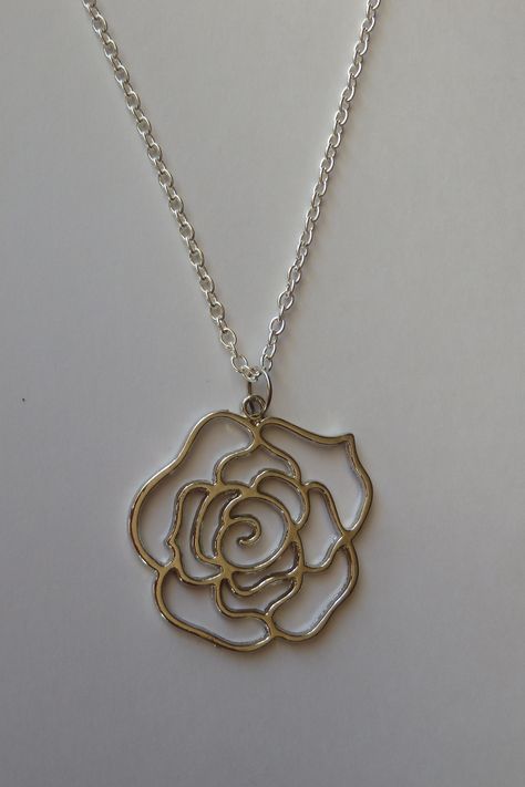 Rose pendant necklace Elegant Rose Design Flower Pendant Necklace, Elegant Rose Design Pendant Necklace, Silver Flower Pendant Jewelry With Rose Design, Silver Rose Design Necklace, Luxury Rose Design Flower Pendant Jewelry, 1950 Outfits, Rose Pendant Necklace, Geometric Rose, Silver Flower Necklace