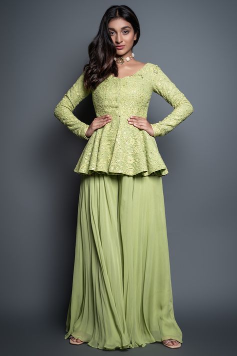 Featuring a lemon green peplum top in georgette and chikankari base with sequins embroidery. It is paired with matching flared palazzo pants.   FIT: Fitted at bust and waist. COMPOSITION: Georgette, Chikankari. CARE: Dry clean only. Gaun Peplum, Peplum Top Outfits, Sharara Designs, Flared Palazzo, Cutwork Blouse, Long Gown Design, Anarkali Dress Pattern, Gaun Fashion, Indian Gowns Dresses