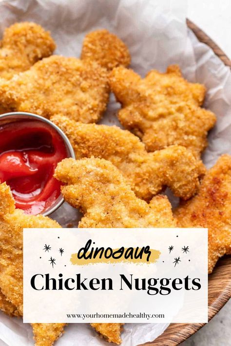 These homemade dinosaur chicken nuggets bring back memories of childhood dinners! They're a great copycat recipe for the classic frozen food. Made with just 6 simple ingredients and baked in the oven, they're a healthier version of this nostalgic favorite, perfect for kids and adults alike. Homemade Frozen Chicken Nuggets, Homemade Dino Nuggets, Childhood Dinners, Homemade Baked Chicken Nuggets, Chicken Nuggets Baked, Homemade Nuggets, Homemade Chicken Nuggets Baked, Kids Chicken Nuggets, Dinosaur Chicken Nuggets