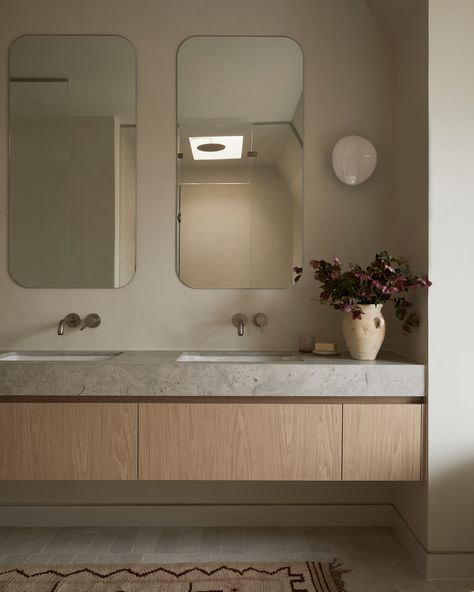 The MOD+ and M.E. collections perfect the tranquil sophistication and timeless luxury of a warm, welcoming bath space by Nunu Interiors.

Designer: Nunu Interior Design / 
Photographer: Lauren Miller
Developer: Ossington Homes

#interiordesign #interiordesignideas #modernbathroom #luxuryhomes #bathroominspo #designinspo #luxurybathroom #GRAFFDesigns #ArtofBath Transitional Design Bathroom, Bathroom With Long Vanity, Lauren Miller, Master Ensuite, Laundry Room Inspiration, House Blend, Timeless Luxury, The Mod, Main Bathroom