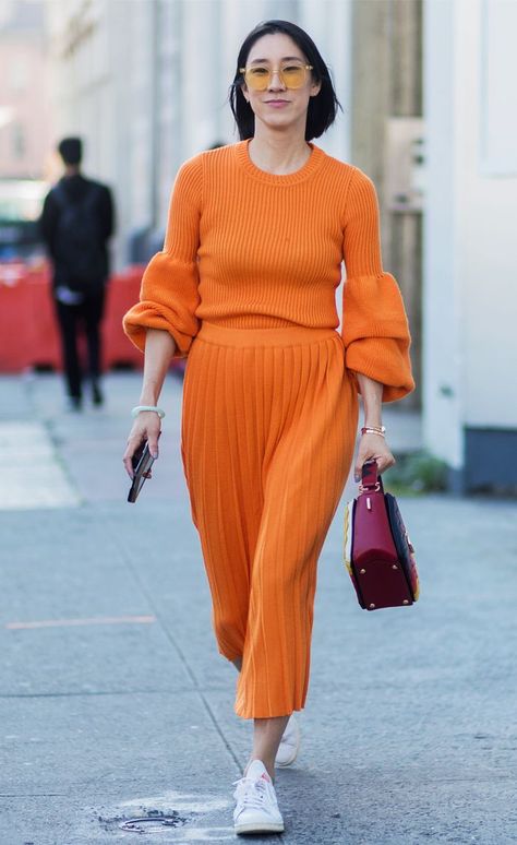 Autumn outfit ideas are coming in thick and fast, thanks to our favourite style bloggers—here are the best of the bunch. Monochrome Orange Outfit, Orange Outfit Monochrome, Orange Dress Street Style, Orange Sweater Street Style, Yellow Sweater Street Style, Fall Outfits 2017, Chic Loungewear, Eva Chen, 2022 Style