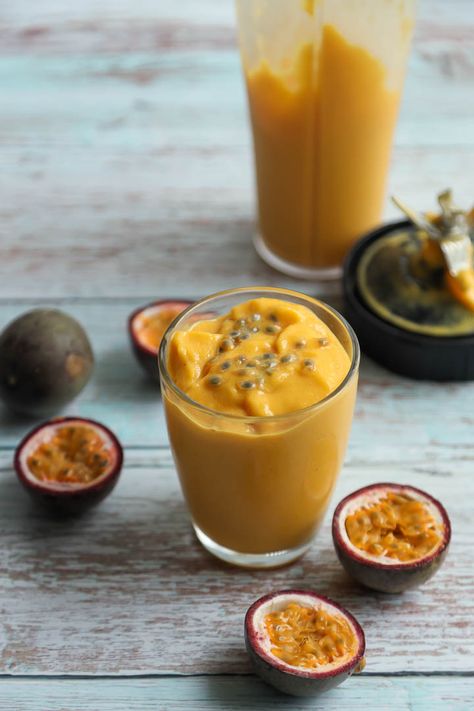 Mango Passionfruit Smoothie - Its summer here and this is the perfect drink to beat those hot and humid days to come. Mango Passionfruit Smoothie is a refreshing tropical iced smoothie made with mango, passion fruit and lime juice. I love sweet and tangy fruits like mango, passionfruit, peach, orange, pineapples and green apples... Mango And Passionfruit Smoothie, Mango Passionfruit Smoothie, Passionfruit Smoothie, Passion Fruit Smoothie, Mango Passionfruit, Kitchen Magic, How To Make Smoothies, Green Apples, Mango Juice