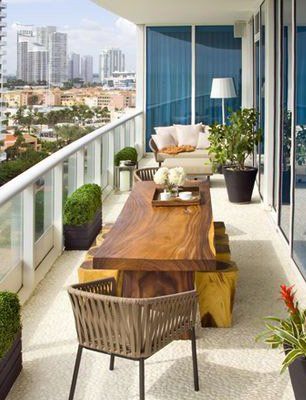 Before buying furniture determine the shape of your patio. For long narrow patios, like this patio (left), choose furniture that echoes the patio shape. Pair your table with garden stools that can easily be tucked in when not in use. 5 Tips for Making Your Small Patio Feel Bigger | Wayfair                                                                                                                                                                                 More Narrow Patio Ideas, Apartment Patio Gardens, Narrow Balcony, Diy Patio Table, Balkon Decor, Rustic Patio, Condo Furniture, Small Terrace, Apartment Patio