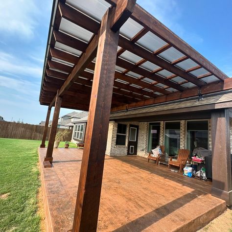 I just finished up this SkyPoly Pergola in Ponder. 28x14. 8x8 posts. 4x12 header. 2x8 joists. 2x4 slats. We lifted off the roof with the SkyLift Roof Risers. We installed the SkyPoly roof. Notched joists. 2’ overhang. We also did the stamped concrete wood texture under the pergola. Text me Chad the tall goofy guy if you want a pergola. 972-342-1645 #pergola #patiocover #pergoladesign #patiodesign #outdoorlivingspace #outdoorlivingroom Skypoly Pergola, Concrete Wood, Stamped Concrete, Outdoor Living Room, Pergola Designs, Wood Texture, The Roof, Text Me, Patio Design