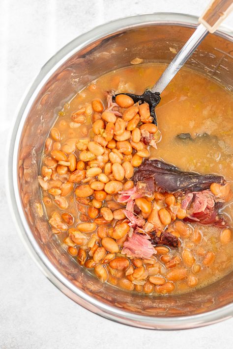 These Instant Pot pinto beans are so simple to make and require no soaking! Just throw in your dried beans, some simple spices, a ham hock for meaty flavor, and in just a little over an hour you'll be rewarded with a big pot of pinto beans. So easy! Instant Pot Pinto Beans Soaked, Instant Pot Pinto Beans And Ham Hock, Pinto Bean Recipes Instant Pot, Instant Pot Pinto Beans No Soak, Power Quick Pot Recipes, Instant Pot Beans Pinto, Ham Hocks And Beans Instant Pot, Dry Beans Instant Pot, Pinto Beans In Crockpot