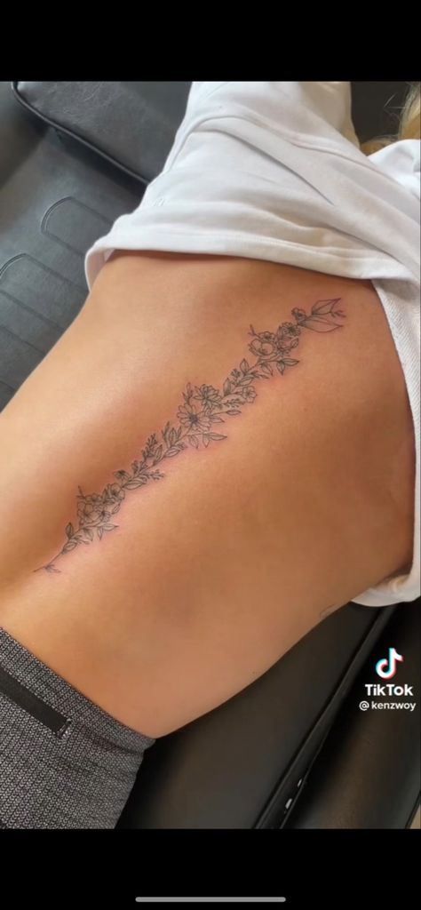 Birth Month Flower Spine Tattoo, October Birth Flower Tattoo Spine, Southern Spine Tattoos, September Flower Spine Tattoo, Straight Line Spine Tattoo, Back Tattoo Women Vines, June Birth Flower Spine Tattoo, Sweet Pea Spine Tattoo, November Birth Flower Spine Tattoo