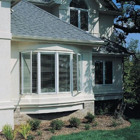 Bay Windows vs. Bow Windows: Understand the Difference | Pella Bay Window Exterior, Bow Windows, Bay Bow Windows, Single Hung Windows, Remodeling Bathroom, Lots Of Natural Light, Double Hung Windows, Bow Window, Classic Cottage