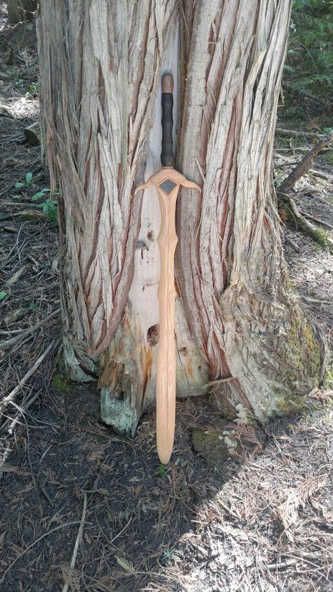 Hand Carved wooden sword by Harts Woodworks on etsy! Fantasy Wooden Staff, Wooden Swords, Wooden Swords Diy Viking, Wood Speargun, Creative Woodworking, Two Handed Longsword, Wood Knife, Wood Carving Patterns, Cosplay Props