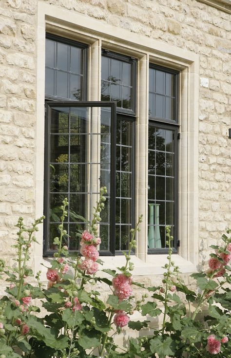 Bronze Windows Exterior Farmhouse, Oil Rubbed Bronze Windows Exterior, Large Front Windows Exterior, Mullions For Windows, Exterior Window Decor, Stone Window Surround, Dark Bronze Windows Exterior, Encasement Windows, Stone Window Frame Exterior