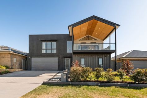 Timber Feature Wall, Container Homes Australia, Grand Designs Australia, Barnyard Door, Engineered Timber Flooring, Timber Staircase, Shipping Container Home, Alfresco Area, Open Fireplace