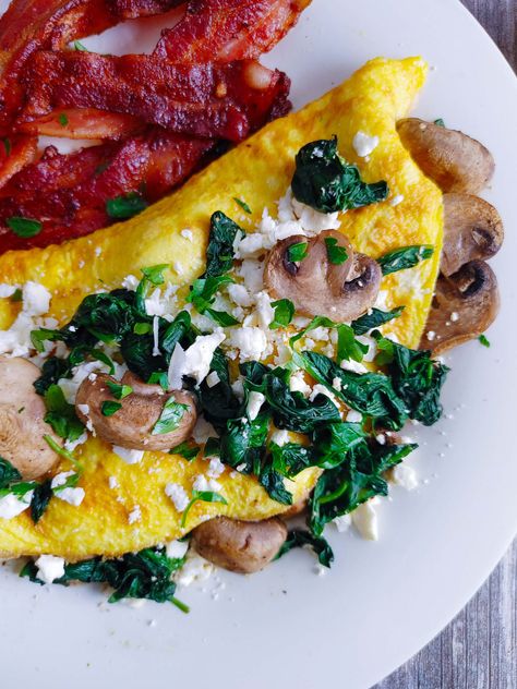 The Perfect Spinach Mushroom Feta Omelette Recipe - U Keep Cooking Feta Omelette Recipe, Feta Omelette, Eggs With Spinach, Mushroom Omelette, Breakfast Skillet Recipes, Spinach Mushroom, Spinach Egg, Omelette Recipe, Sauteed Spinach