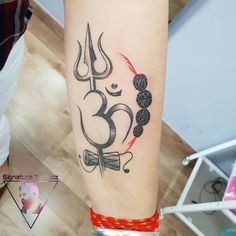 trishul and om tattoo Done by Nitin gautam at Signature tattooz Om Wrist Tattoo, Lord Shiva Trishul, Om Tattoo Designs, Om Tattoos, Aum Tattoo, Authentic Tattoo, Shiva Trishul, Om Symbol Tattoo, Tattoo Designs With Meaning