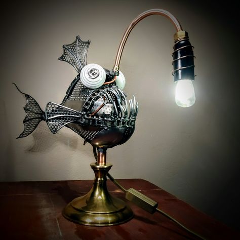 Steampunk Fish, Waste Fashion, Workshop Garage, Steampunk Lighting, Zero Waste Fashion, Metal Fish, Angler Fish, Steampunk Style, Garage Workshop