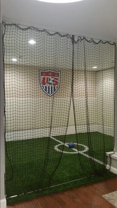 Basement soccer                                                                                                                                                                                 More Home Soccer Field Indoor, Soccer Basement Ideas, Indoor Soccer Field In Basement, Indoor Soccer Field In House, Basement Soccer Field, Soccer Bedroom Ideas For Boys, Boys Bedroom Ideas Soccer, Cool Basement Room Ideas, Boy Soccer Room