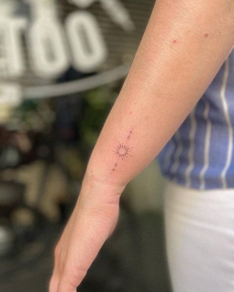 Sun Tattoo With Date, Small Tattoos Sun Moon Stars, Sun Tattoo On Wrist, Sun Tattoo Wrist, Sun Fine Line Tattoo, Sun Wrist Tattoo, Sunshine Tattoos For Women, Dainty Sun Tattoo, Sun And Stars Tattoo