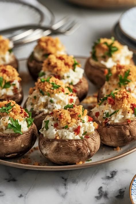 A photo of a  Zesty Stuffed Mushrooms a New Years Eve Food Party Ideas New Year's Food Ideas, New Year Food Table, New Year’s Eve Meals, New Year’s Eve Dinner, New Years Brunch Ideas, New Year Eve Food, New Year Meals, Super Bowl Finger Foods, New Years Eve Snacks