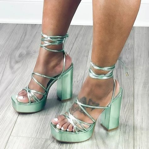 Make a grand entrance at the party with our Platform Sandals Party Wrap Shoes! 🎉👡 These stunning sandals feature a platform sole and a wrap-around design that adds a touch of elegance and sophistication to your ensemble. Step into style and let your feet steal the show. Chunky Heel Platform Sandals, Hoco Inspo, Woman's Closet, Green Platform, Random Clothes, Tie Up Sandals, Chunky Heel Shoes, Green Heels, Prom Heels