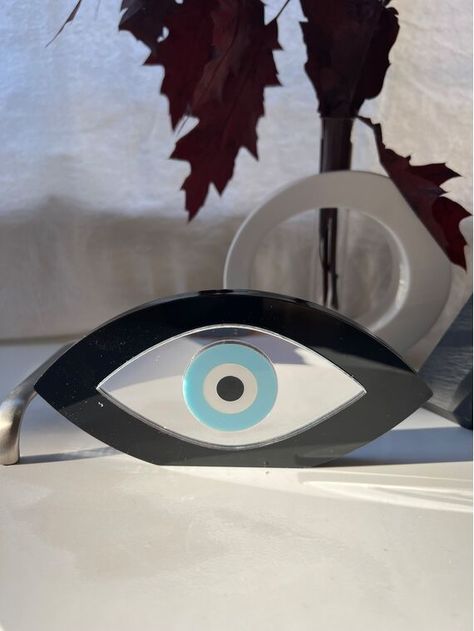 This is a an Oval Evil Eye Ornament that is made from plexiglass and decorates a home or an office, with a simple and stylish way. It is able to stand in every surface and this can make it the perfect gift to wish ''Merry Christmas'', ''Happy New Year'' or for youw warmest wishes for a newborn member. Of course you can just decorate a house or an office. Find it only at Christina Christi Store. Eye Ornament, Minimalist Christmas Decor, Warmest Wishes, Eye Decor, Types Of Gifts, Home Protection, Minimalist Christmas, Christmas Happy, For Sale Sign