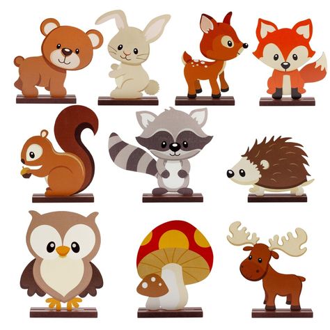 Delight in the enchanting charm of our Woodland Friends Figurine Collection. Each painted cutout is designed with meticulous detail, capturing the whimsical essence of forest wildlife. This adorable set includes a variety of forest creatures such as a cheerful bear, a playful rabbit, a wise owl, a friendly hedgehog, a mischievous raccoon, and a curious squirrel, among others. Sized approximately 6 x 4.5 inches, these sturdy wood figures are freestanding, making them perfect for adding a touch of nature's magic to any setting. Whether you're looking to spruce up a baby nursery with a touch of gentle wilderness, captivate children’s imaginations in a classroom, or create a heartwarming centerpiece for a woodland-themed baby shower or party, these figurines are versatile and visually appealin Woodland Arch, Woodland Baby Shower Backdrop, Woodland Centerpieces, Woodland Baby Shower Centerpieces, Woodland Party Decor, Forest Animals Preschool, Para Educator, Woodland Baby Shower Theme, Woodland Party Decorations