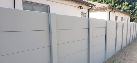 Smooth Stone Precast Concrete Fences & Walls | American Precast Concrete Fence Wall Design Ideas, Precast Fence Ideas, Fence On Concrete Wall, Precast Concrete Fence, Concrete Fence Panels, Concrete Fences, Concrete Panel Facade, House Gates, Concrete Fence Wall