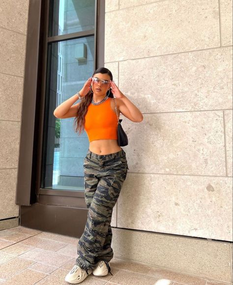 Camo Pants And Orange Top, Army And Orange Outfit, Camo With Orange Outfit, Army Cargos Outfits, Camo And Orange Outfit, Camo Cargo Outfit, Camo Pants Outfit Baddie, Army Cargo Pants Outfit, Army Pants Outfit