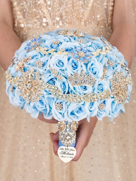 Light Blue Gold quinceanera bouquet 13 inches Light Blue Quince Ramo, Sky Blue Quinceanera Theme, Gold Quinceanera Bouquet, Blue Gold Quinceanera, Cinderella Bouquet, Baby Blue Quince, Blue Quinceanera Ideas, Quince Bouquet, Winter Wonderland Quinceanera