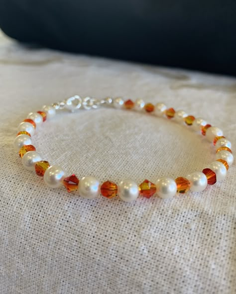 Excited to share this item from my #etsy shop: Dainty Orange and Pearl Bracelet Orange Beaded Jewelry, Orange Bead Bracelet Ideas, Fall Beaded Bracelets Diy, Autumn Jewelry Diy, Orange Bracelet Ideas, Orange Beaded Bracelet, Orange Beads Bracelet, Autumn Bracelet Ideas, Orange Beaded Bracelets