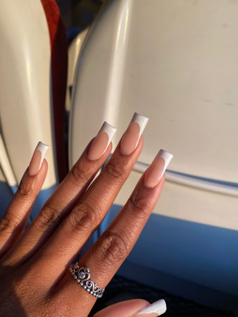 French tips for black girls, nails for black girls, nails in sun, long nails, white nails, peach nails. Black Girls French Tip Nails, Nail Designs For Black Girls Style, White French Tip Nails Black Women, White And Peach Nails, White Long French Tip Nails, French Tips Black Women, French Nails Black Women, French Tip Black Women, Peach French Nails