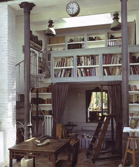 Wonderful library. It has so much I like--the gorgeous metal spiral staircase, the reading nook underneath, the worn old furniture and all the built in shelves. Want. Lots Of Books, Fairytale Aesthetic, Concept Ideas, Wall Bookshelves, Home Libraries, Decor Minimalist, Home Library, Home Interiors, Book Nooks