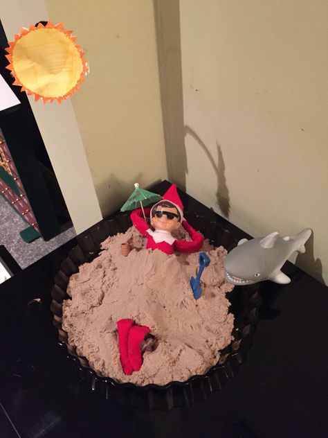 Elf on the shelf chilling on the beach Elf On The Shelf Beach Ideas, Elf On The Shelf Beach, Elf On The Shelves, Elf Shenanigans, Shelf Elf, Awesome Elf On The Shelf Ideas, Xmas Elf, Elf Antics, Elf Fun