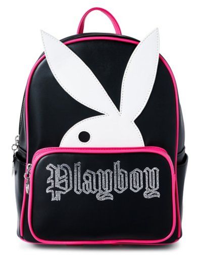 Hoping to find a backpack that totally fits your Playboy lifestyle? Add this officially licensed Pink and Black Playboy Rhinestone Mini Backpack to your collection and you'll always be ready to travel in style. Accessorize with this backpack that features a Playboy Bunny design with rhinestone details on the front and you'll always have plenty of space for all of your daily essentials. Officially licensed Adjustable straps Strap Length: 32" 1 Front zipper pocket 2 Side pockets Zipper closure Dimensions: 12" H x 9" W x 4.5" D Material: Polyurethane, polyester Care: Spot clean Imported Cool Mini Backpack, Baddie Decor, Y2k Backpack, Emo Mcbling, Pretty Backpacks, Casetify Iphone Case, Cool Kidz, Heat Bag, Gothic Bag