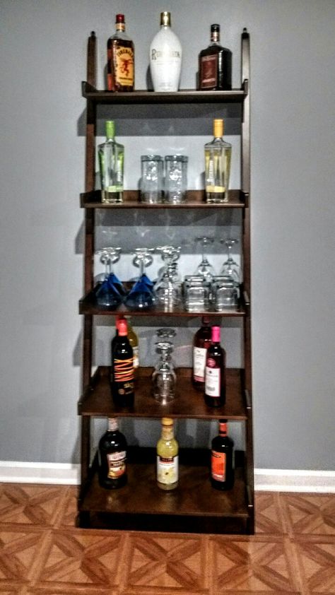 My DIY Basement Project Ladder Shelf Home Bar.... Liquor Stand Ideas, Ladder Shelf Bar Ideas, Ladder Bookshelf Bar, Bar Bookcase Ideas, Ladder Shelf Bar, Bookshelf Bar Ideas, Kitchen Ladder Shelves, Diy Home Bar Ideas, Bar Bookshelf