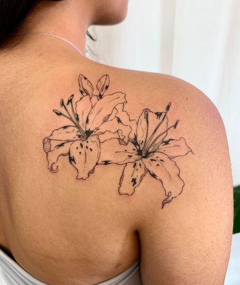 Lily Back Tattoo For Women, Stargazer Lilies Tattoo, Back To Shoulder Tattoo, Japanese Lily Tattoo, Lilly Spine Tattoo, Lily Tattoo Arm, Lily Flower Tattoos Shoulder, Small Lilly Tattoo, Hibiscus Shoulder Tattoo