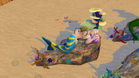 The mermaids reef bed  Because you must to be able to sleep somewhere under the ocean.  4 different colors for the corals bed. Sims 4 Sea Monster Cc, Sims 4 Sea Witch Cc, Sims 4 Mermaid Furniture, Sims 4 Mermaid House, Sims 4 Cc Mermaid, Mermaid Furniture, Sims 4 Hair Male, Mermaid Bedding, Fantasy Play