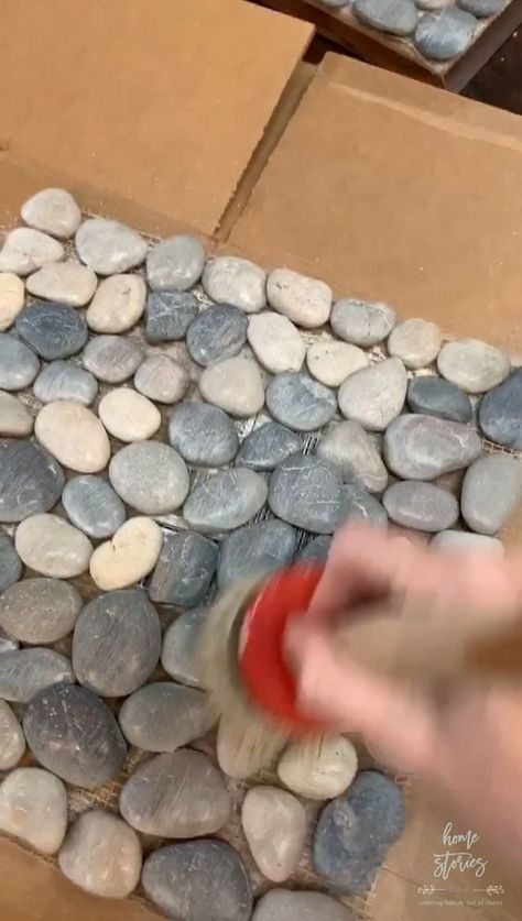 Fireplace Makeover { How to Tile Over Existing Tile Tutorial } | Home Stories A to Z Whitewash Tile Fireplace, Pebble Stone Fireplace, Stone Over Tile Fireplace, Stone Tile Fireplace Ideas, Pebble Fireplace, Fireplace Floor Tile, Fireplace Facelift, Tile Around Fireplace, Tile Over Tile