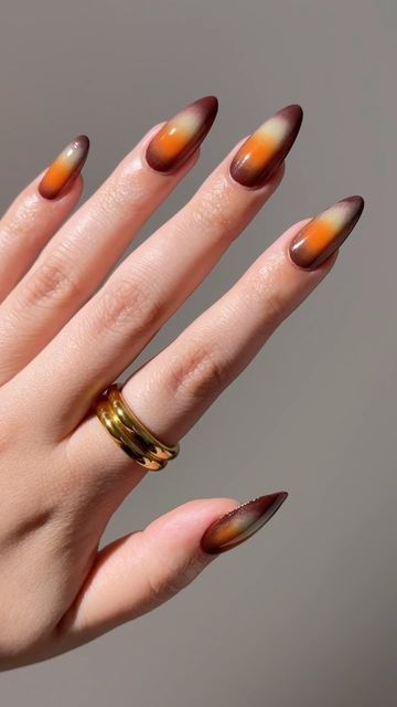 Lights Lacquer on Instagram: "How to create the perfect autumn ombre aura nails 🤎  Polishes used: Espresso, Hide the Rum!, Arrivederci & Totally Gelly.   #lightslacquer #nails #nailinspo #fallnails #athomenails #fallinspo #almondnails #brownnails #greennails #orangenails #easynails #simplenails #nailhack #nailartinspo #naildesign #nailart #trendynails #trendynailart #nailpolish #nailtutorials #nailartvideos #demure #gilmoregirlsedit" Ombre Nails With Charms, Ombre Aura Nails, Autumn Aura Nails, Aura Nails Fall, Fall Aura Nails, Ombre Nails Almond, Amber Nails, Lights Lacquer, Boring Nails