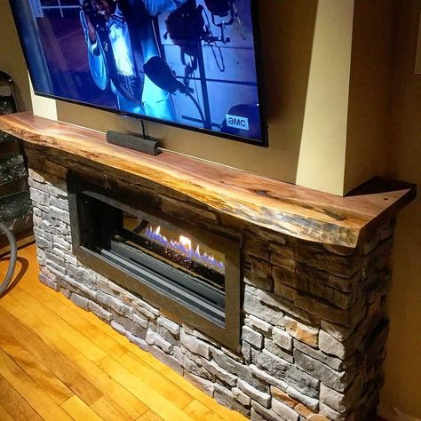 Custom live edge black walnut mantel for a client.  For this one we cut a larger slab so it wrapped around the fireplace.  We did a satin clear coat on the piece to accentuate the nice grain in the walnut. Live Edge Mantle, Cottage Muskoka, Rustic Wood Mantle, Pine Mantle, Fireplace Mantle Ideas, Live Edge Fireplace Mantel, Walnut Mantel, Fireplace Mantle Shelf, Live Edge Black Walnut