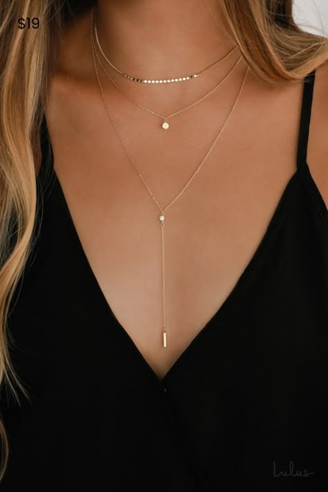 The Lulus Coretta Layered Gold Necklace is here to make your outfit perfect! Three layers of dainty gold chains, embellished with a row of round charms, a circle charm, and a drop chain embellished with a single rhinestone and bar charm, all come together to create a simple yet sweet look. Lobster Clasp Closure. Shortest Chain Measures 13. 5" Long. Longest Chain Measures 16. 5" Long With A 3" Extender Chain. Drop Measures 4". Man Made Materials. Imported. Lulus | Coretta Layered Gold Necklace. Layered Gold Necklace, Layer Necklaces, Gold Outfit, Body Chains, Costume Jewelry Necklaces, Gold Necklace Layered, Girly Jewelry, Accessories Jewelry Necklace, Short Necklace