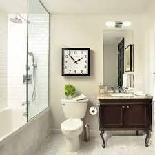 Contemporary Bathroom Remodel, Bathroom Tower, Eclectic Bathroom Design, Shower Hardware, Marble Bathroom Floor, Bathroom Clock, Beige Cabinets, Recessed Panel Cabinets, Beautiful Bathroom Designs