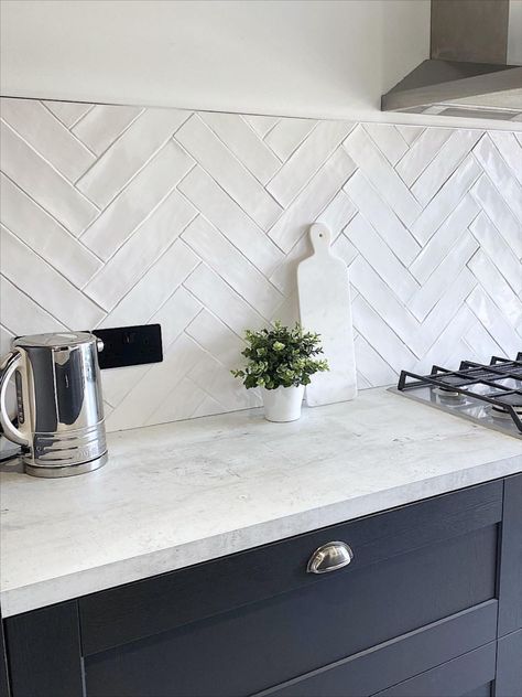 White Herringbone Tile, Herringbone Kitchen, Concrete Countertops Over Laminate, Kitchen Splashback Tiles, Countertops Concrete, White Kitchen Tiles, White Kitchen Backsplash, White Tile Backsplash, White Pitcher