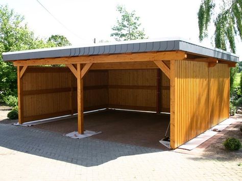 Not everyone wants a garage or all of the requirements it takes to build one as every city has different requirements, but perhaps you still desire something to cover your car, and still looks attractive in your yard. Options and inspirations reach to an attached carport, one that has an open design, or even a... Read More Prefab Garage Kits, Attached Carport, Wooden Carports, Building A Carport, Prefab Garages, Carport Ideas, Diy Carport, Carport Sheds, Carport Plans