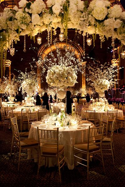 With an all-white color palette, these over-the-top centerpieces exude a luxurious vibe. Winter Wedding Venues, White Wedding Flowers, Wedding Moments, Fairytale Wedding, Wedding Planners, Reception Decorations, Wedding Centerpieces, Future Wedding, Event Decor