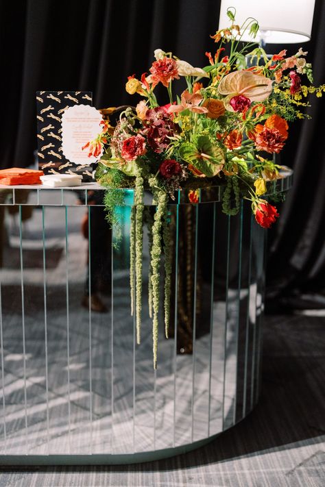 Vibrant bar florals for planner event at the Four Seasons Nashville. Unique and fun florals in bright colors. Floral colors in chartreuse, red, magenta, yellow, blush, and peach. Colorful floral design with orchids, poppies, tropical flowers, and amaranthus. Funky event design with tropical florals and leopard print accents. Design by Rosemary & Finch Floral Design in Nashville, TN. Funky Wedding Table Decor, Wedding Bar Floral Arrangements, Bar Florals, Bar Flowers, Flowers Chandelier, Yellow Blush, Gucci Garden, Funky Wedding, Event Florals