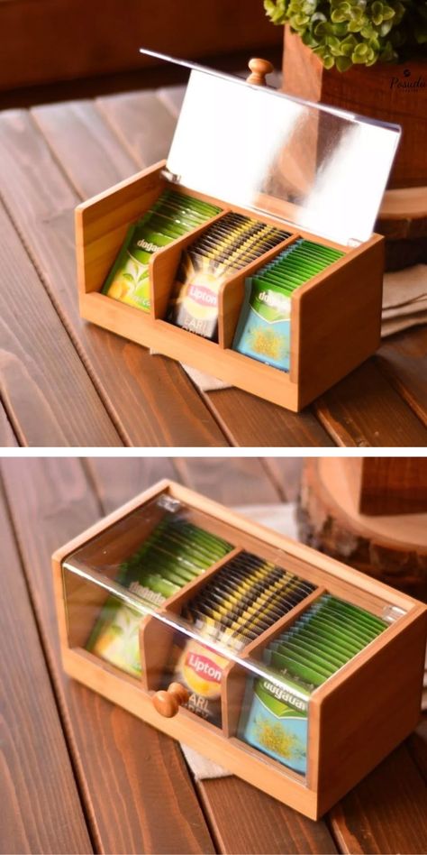 This wooden tea box features a transparent lid for easy viewing of your tea selection. Its sturdy design and natural wood finish make it both practical and decorative.  Materials Needed:  Wooden box with dividers Transparent acrylic or glass sheet Small wooden knob Wood stain or paint (optional) DIY Instructions:  Sand the wooden box to smooth the edges. Attach dividers to create compartments for tea bags. Secure the glass or acrylic sheet as the lid, using hinges or clips. Add a knob for easier opening. Additional Tips: For a rustic touch, leave the wood unfinished. If you prefer a modern look, stain or paint the box to match your kitchen décor. Wooden Box Designs Diy, Small Wood Box Ideas, Tea Box Diy, Wood Tea Box, Wood Box Design, Creative Storage Ideas, Small Wood Box, Wooden Box Designs, Wooden Tea Box