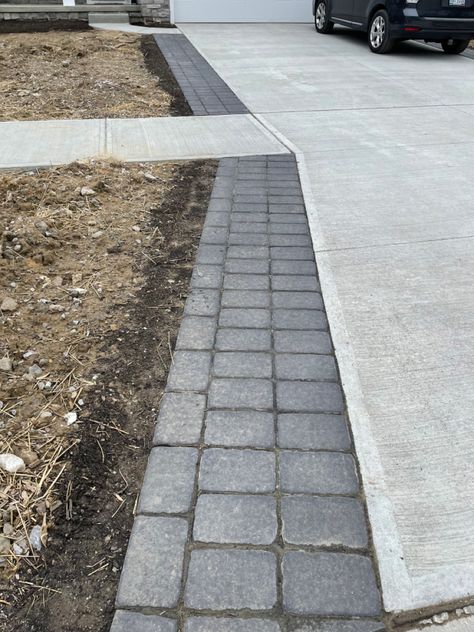 Pavers Walkway Next To Driveway, Widen Driveway Ideas Pavers, Pavers Around Driveway, Pavers Along Driveway, Adding Pavers To Side Of Driveway, Black Brick Pavers, Pavers To Extend Driveway, Pavers On Side Of Driveway, Black Pavers Walkways