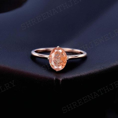 Sunstone engagement ring art deco oval cut sunstone rose gold ring Vintage ring solitaire ring simple ring natural ring Anniversary gift Welcome to Shreenathjewelry JUST OPENED- Experience beautiful jewelry that complements your everyday style, and completes your look. Our jewelry is so stunning, and so you are. Ring description Primary Stone- Sunstone (Natural) Stone Color:- Orange Stone Shape:- Oval Stone Size:- 8x6MM Jewelry Type: Stacking Ring  Method: Cast Personalization: Possible Occasion: Engagement Ring Size: We make rings from US 4 to US 10. (If you need smaller or bigger ring size, please ask me to resize) Country of Manufacture: India All our work is custom made by hand with Love and Care in our workshop ♥ CUSTOM ORDERS Please let us know if you want any customization or person Sunstone Engagement Ring, Orange Stone, Nature Ring, Big Rings, Engagement Ring Sizes, Art Deco Engagement Ring, Oval Stone, Rings Simple, Stacking Rings