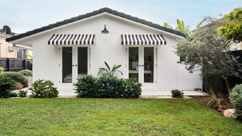 Behind the listing: From 'the ugliest house on the street' to a bright coastal sanctuary Australian Country Houses, Remote Blinds, Weatherboard House, Concrete Bench, Brick Home, Built In Seating, Beach Shack, White Planters, 3 Bedroom House